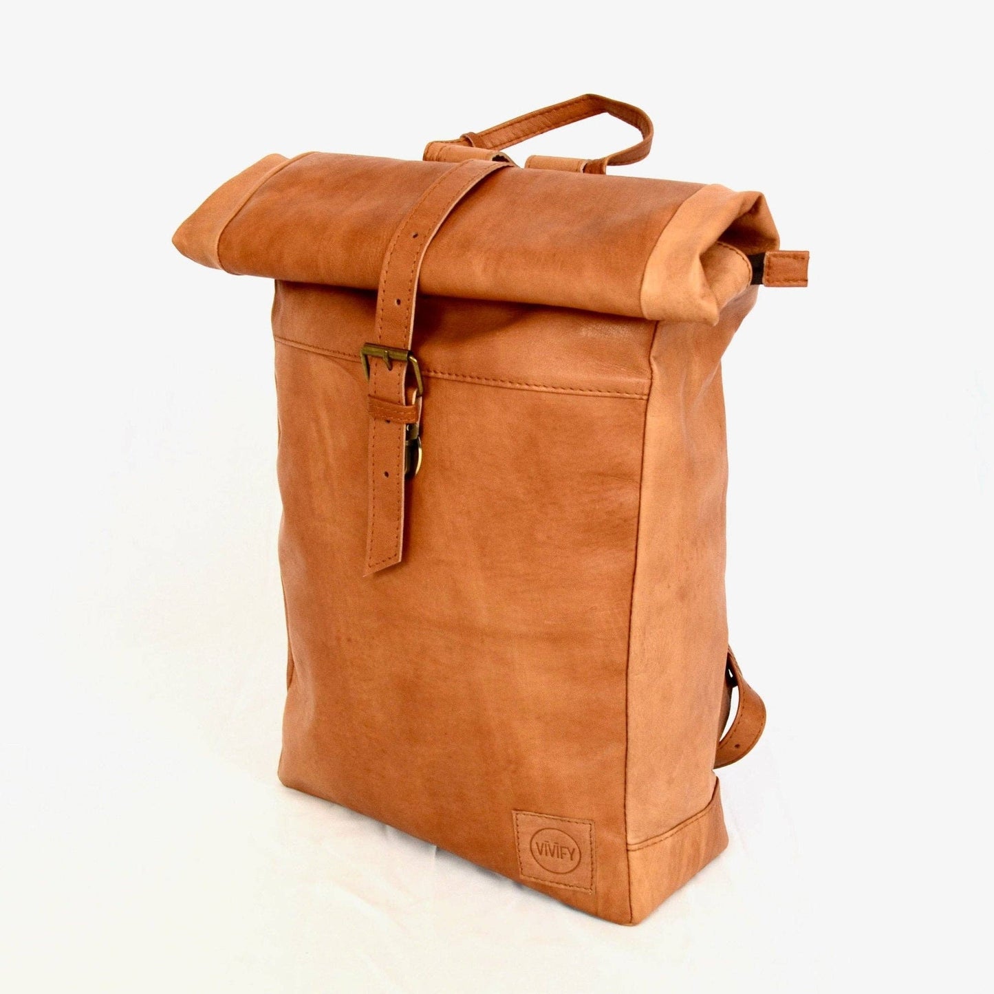 Brown leather roll-top backpack on a white background