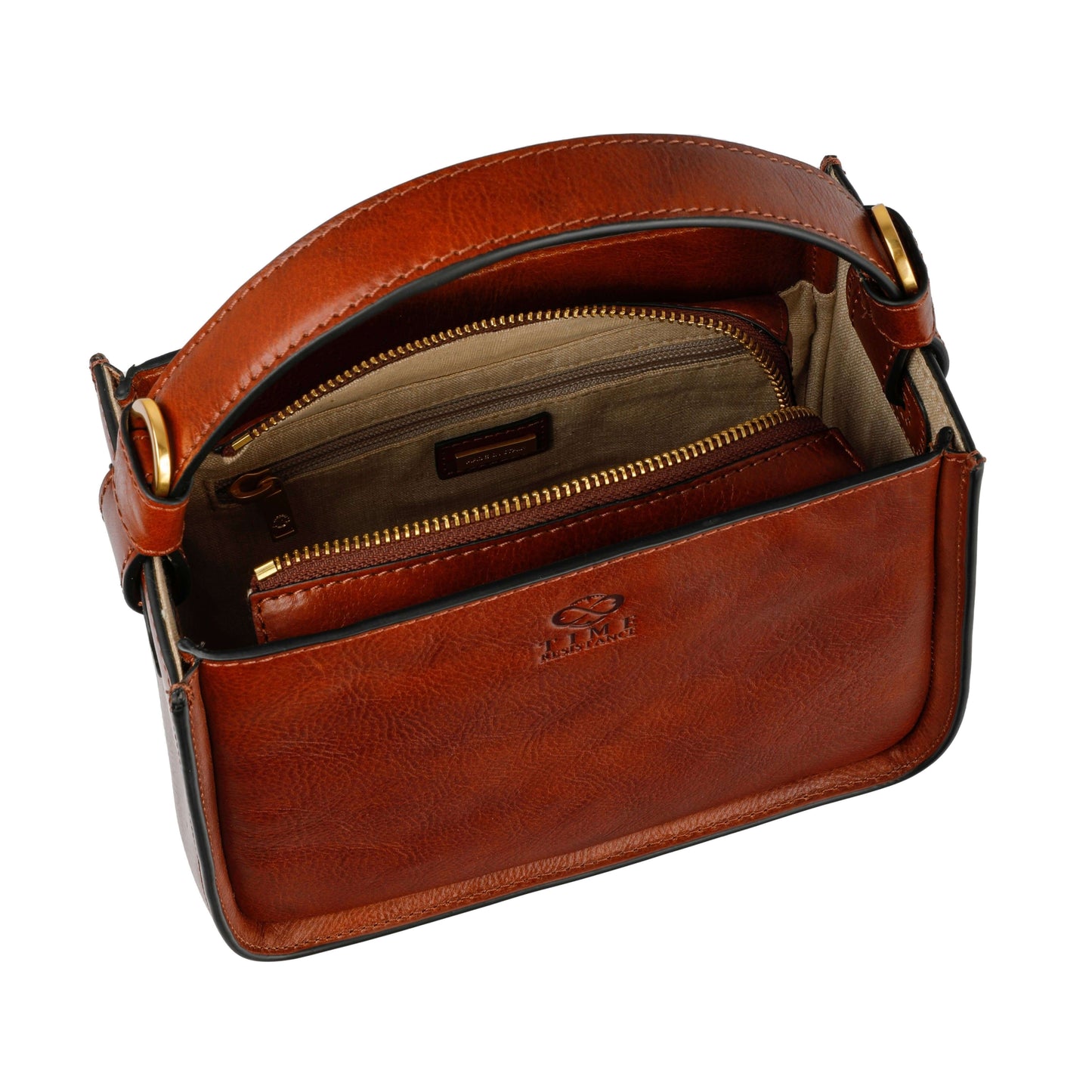 Inside view of the Alms for Oblivion women's leather handbag, showcasing its spacious cotton-lined interior and zip pocket.