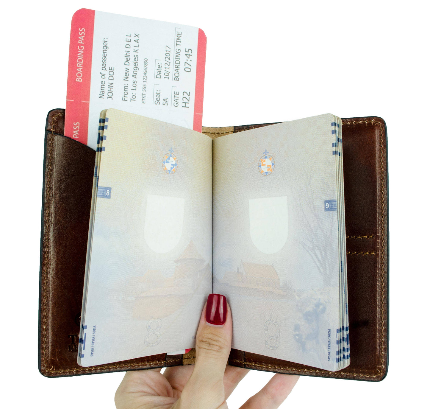 Passport holder with open passport and boarding pass on a white background