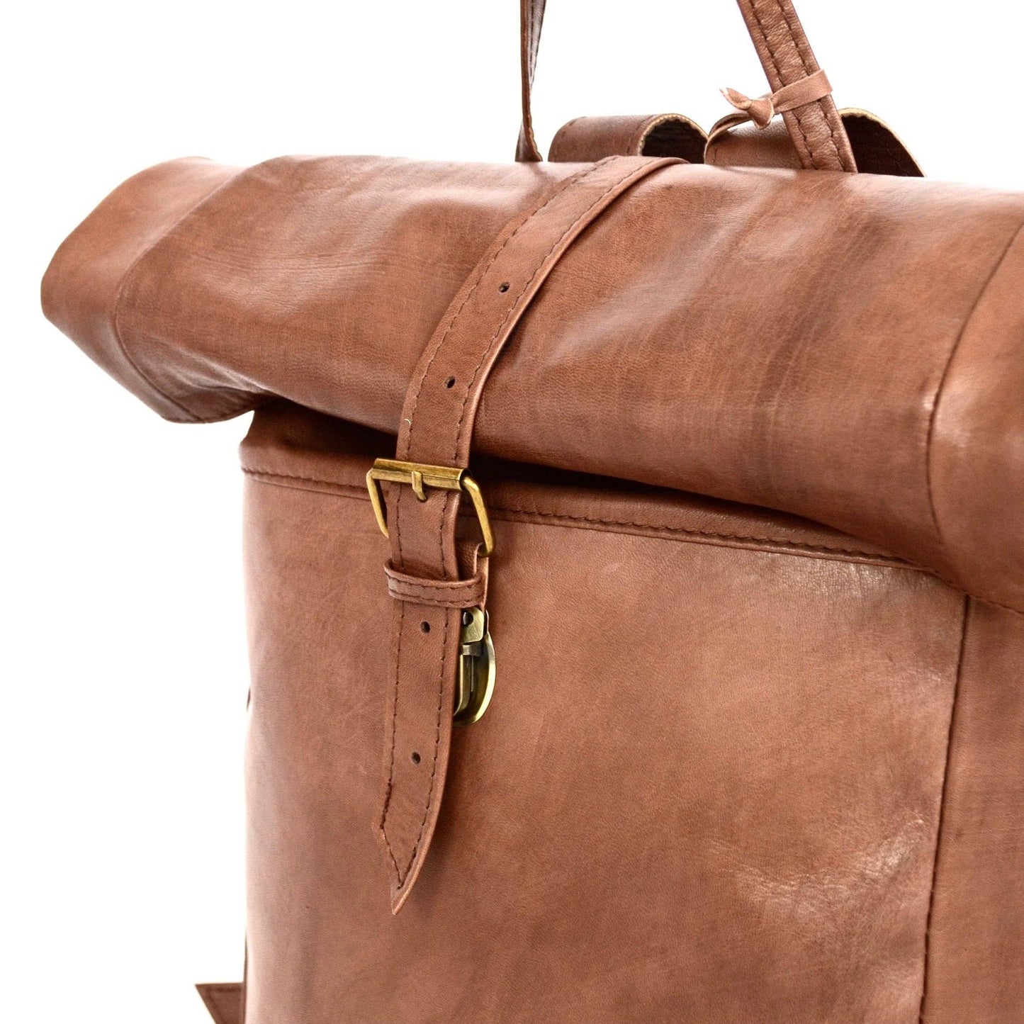 Brown leather backpack with gold buckle on a white background
