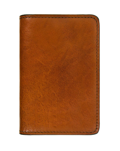 Brown leather passport holder, handcrafted for elegance and travel functionality.
